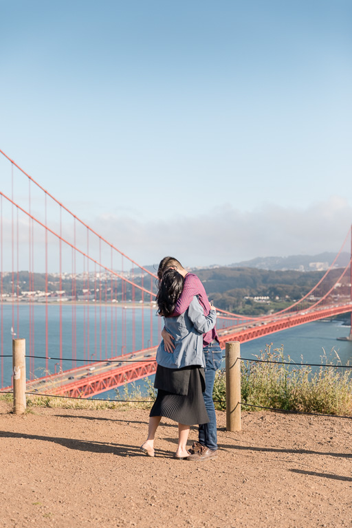 couple hugging at the Golden Gate Bridge
