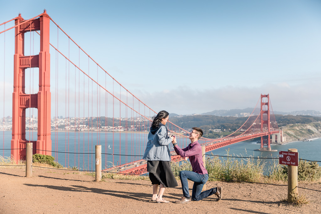 surprise proposal overlooking Golden Gate Bridge