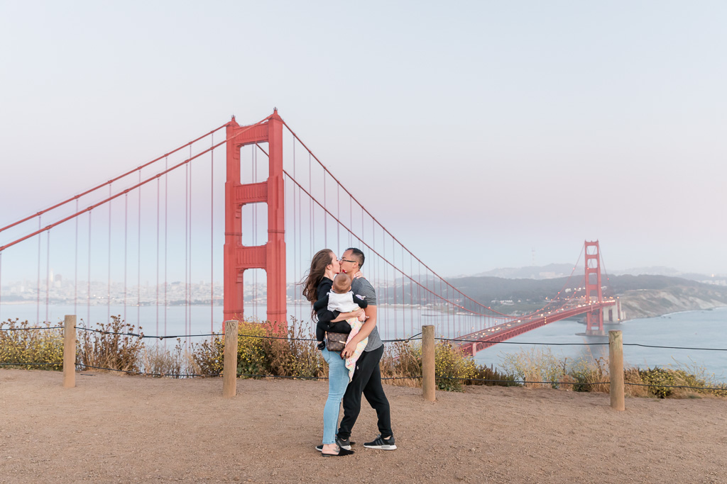 a surprise proposal in front of the golden gate bridge