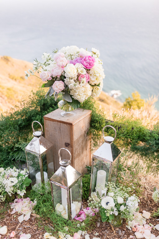 floral set up by the ocean at Post Ranch Inn for a surprise proposal