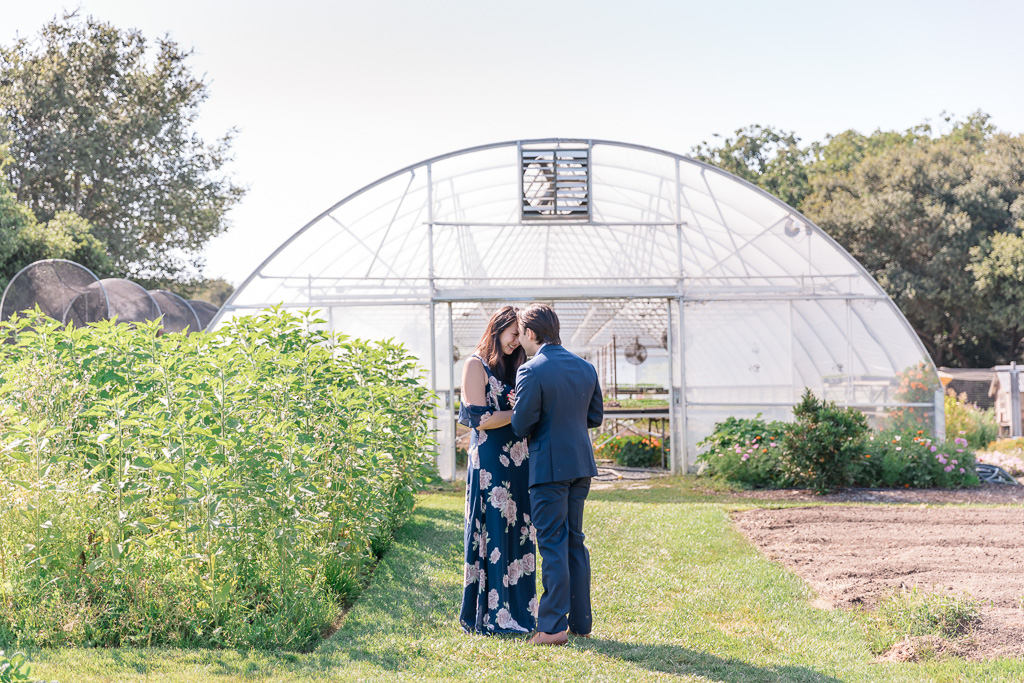 surprise proposal in front of a cute greenhouse
