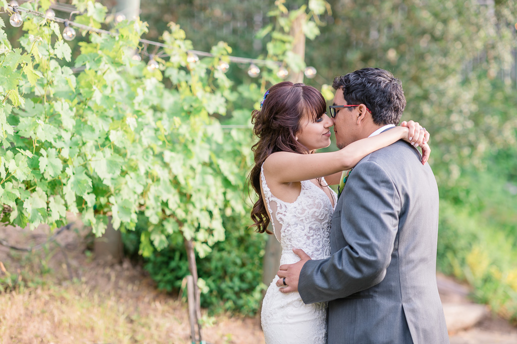kissing in the backyard vineyard