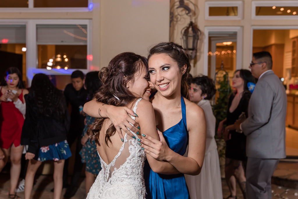 bride dancing with her sister