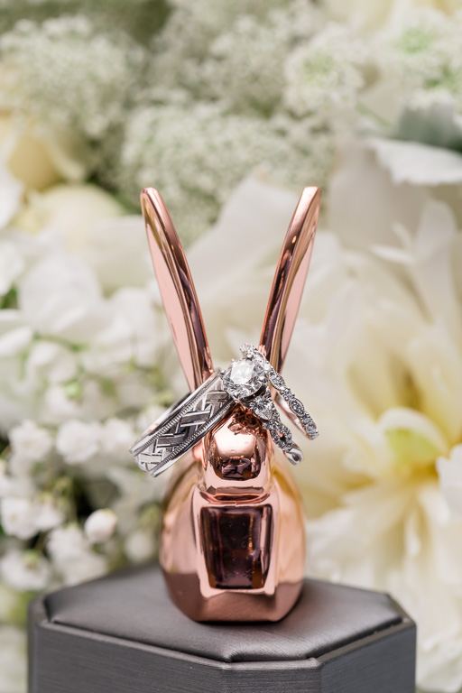 cute wedding ring shot with a metallic bunny