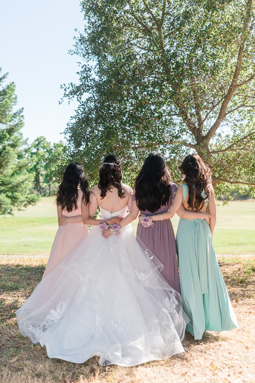 back shot of the bride and bridesmaids