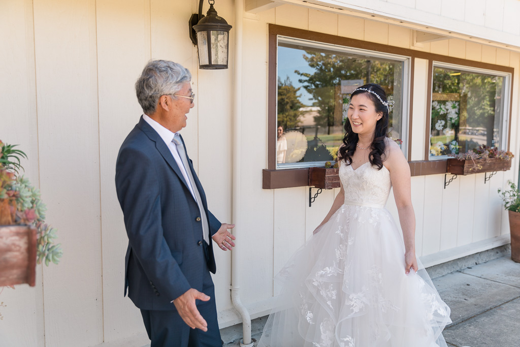 dad seeing the bride in her wedding gown