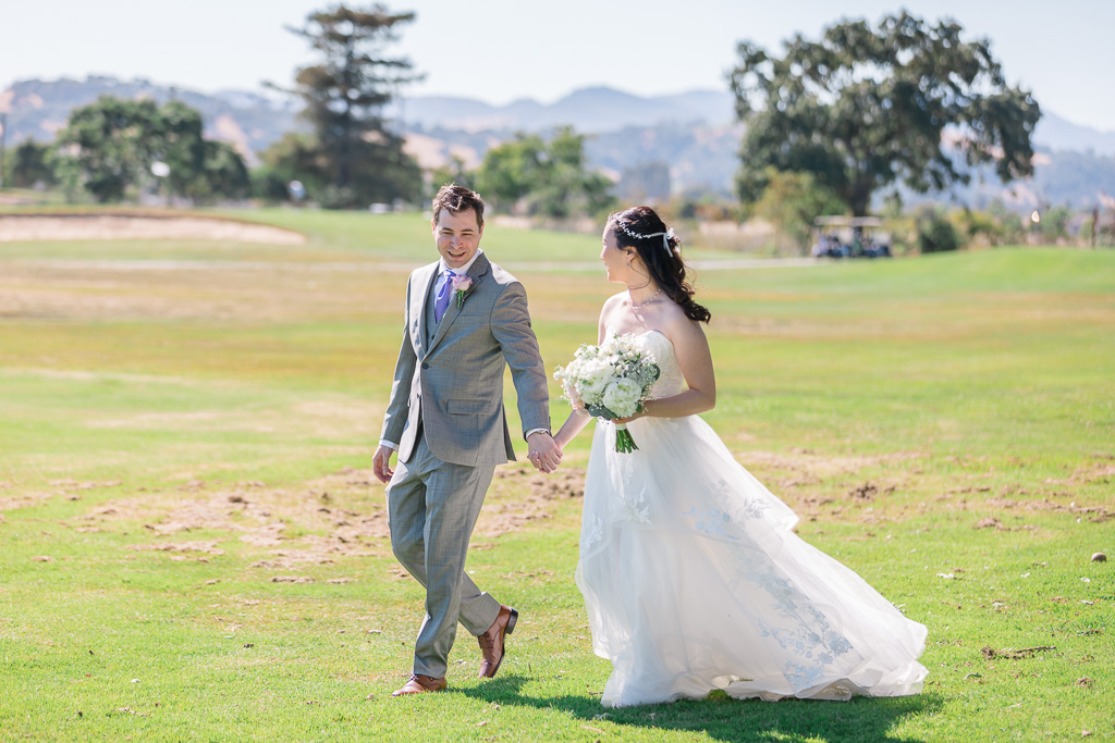 bride and groom strolling on the Kennedy Park golf course