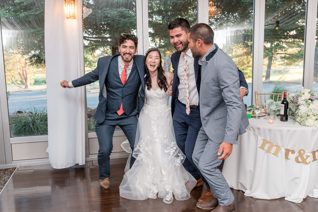 bride dancing with her goofy friends