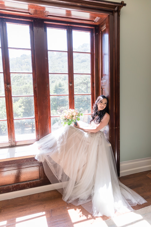 stunning bride by the window