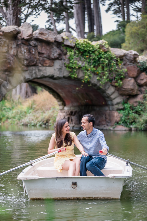romantic stow lake engagement photo in a boat