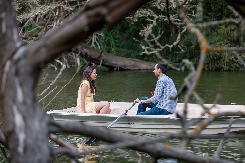 engagement photo in a paddle boat