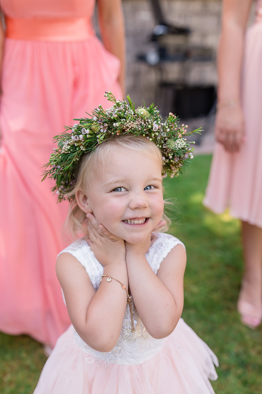 adorable flower girl with a flower crown