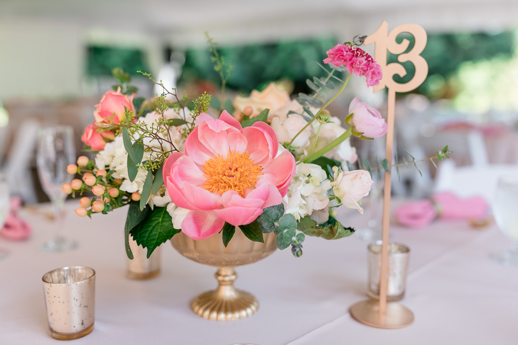 pink and gold floral centerpiece for an outdoor summer wedding at the Rock Creek Gardens