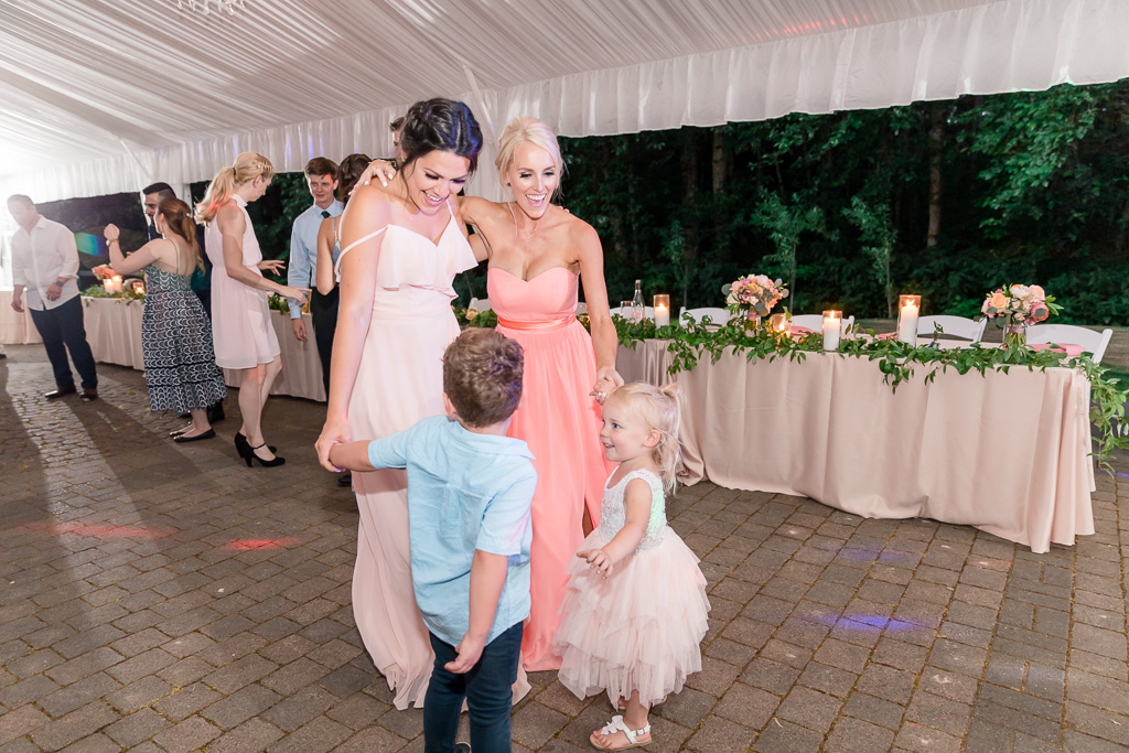 bridesmaids dancing with the little ones