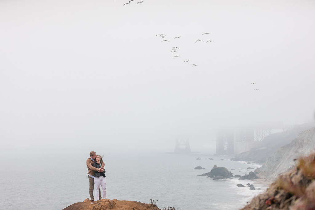 cuddling up for a dreamy engagement photo in San Francisco