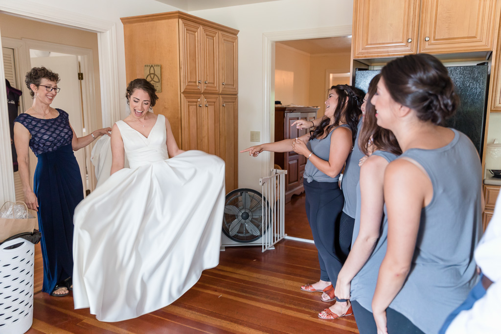 bride doing a first look with her bridesmaids