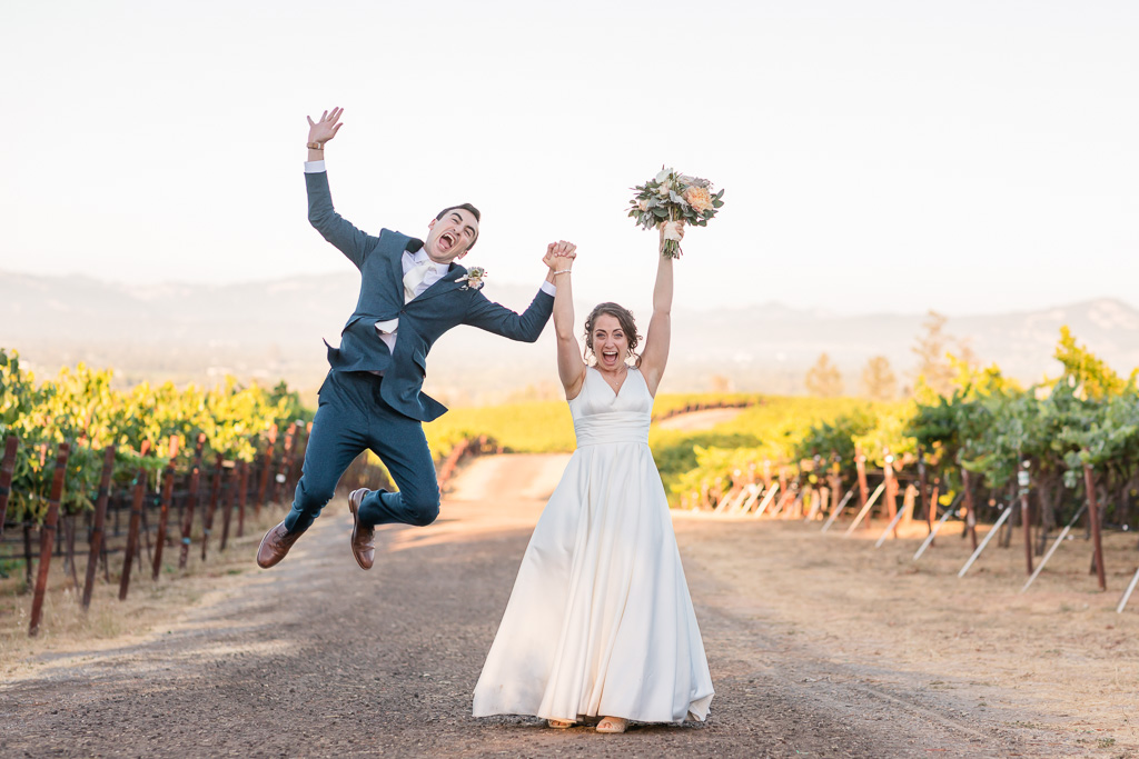 jumping photo of the bride and groom