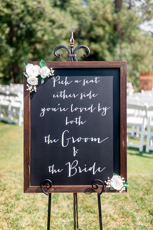 wooden chalkboard wedding ceremony sign