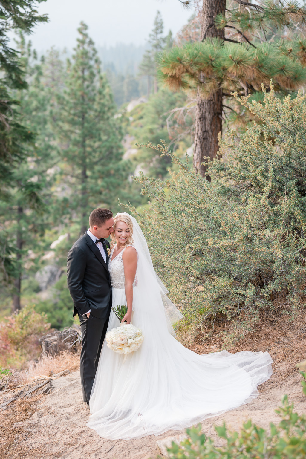 adventurous outdoorsy wedding photo on top of the Take Tahoe mountains