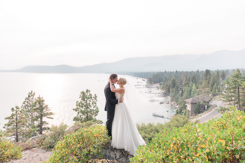 panorama wide angle wedding photo of Lake Tahoe and mountain background