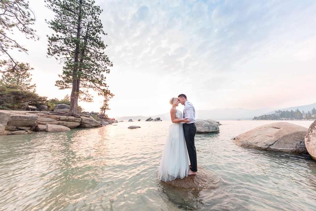 best North Lake Tahoe beach wedding sunset photo on the water