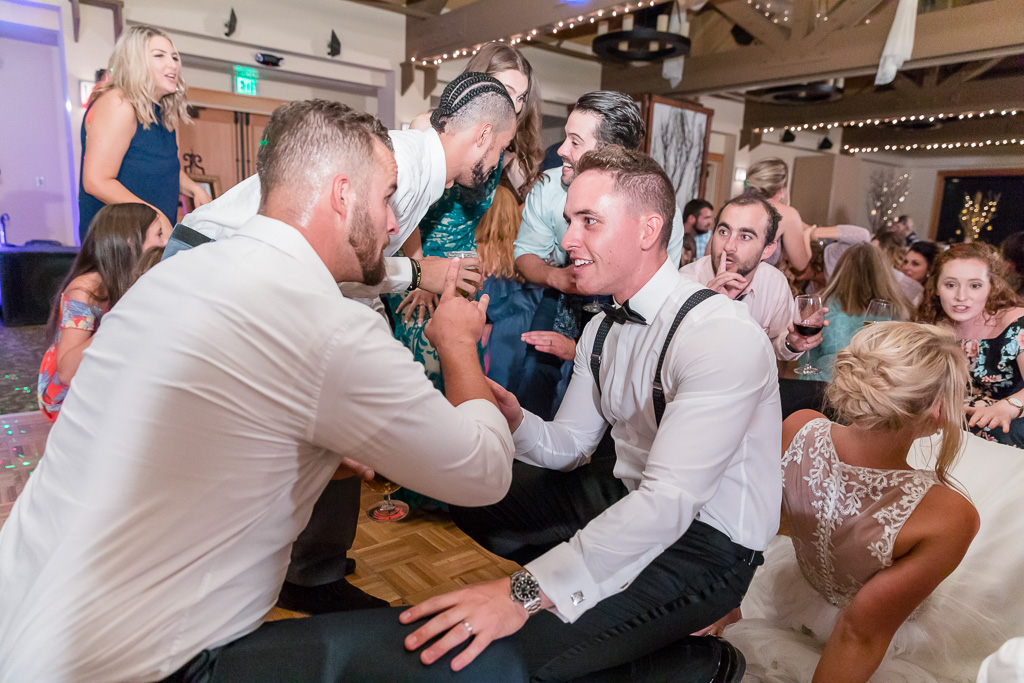 groom dancing with groomsman