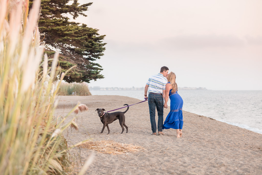Crown Memorial State Beach engagement photo with a puppy
