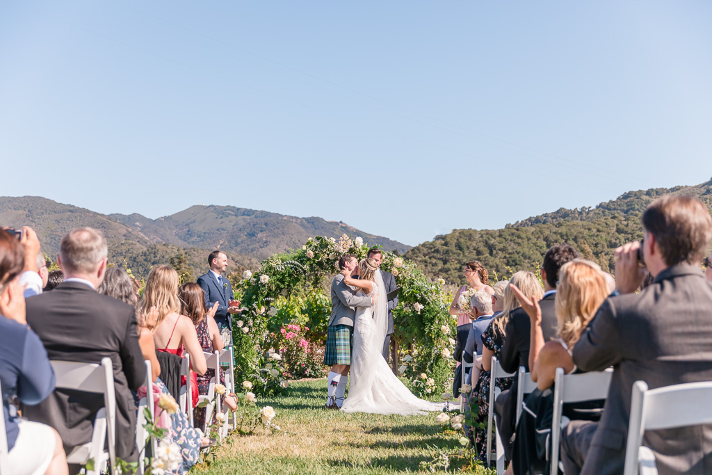 Folktale Winery wedding ceremony surrounded by mountains