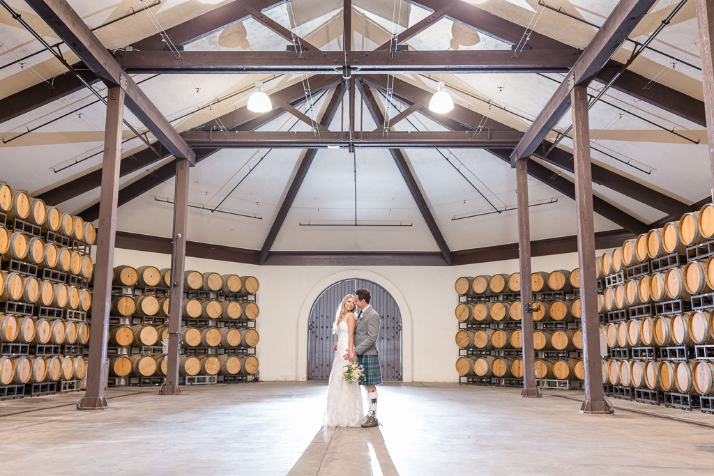 romantic wedding portrait at Folktale Winery barrel room