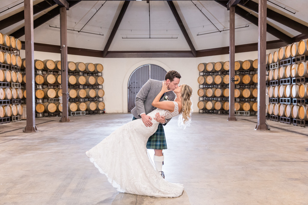 newlyweds enjoying a dance together in the Folktale barrel room