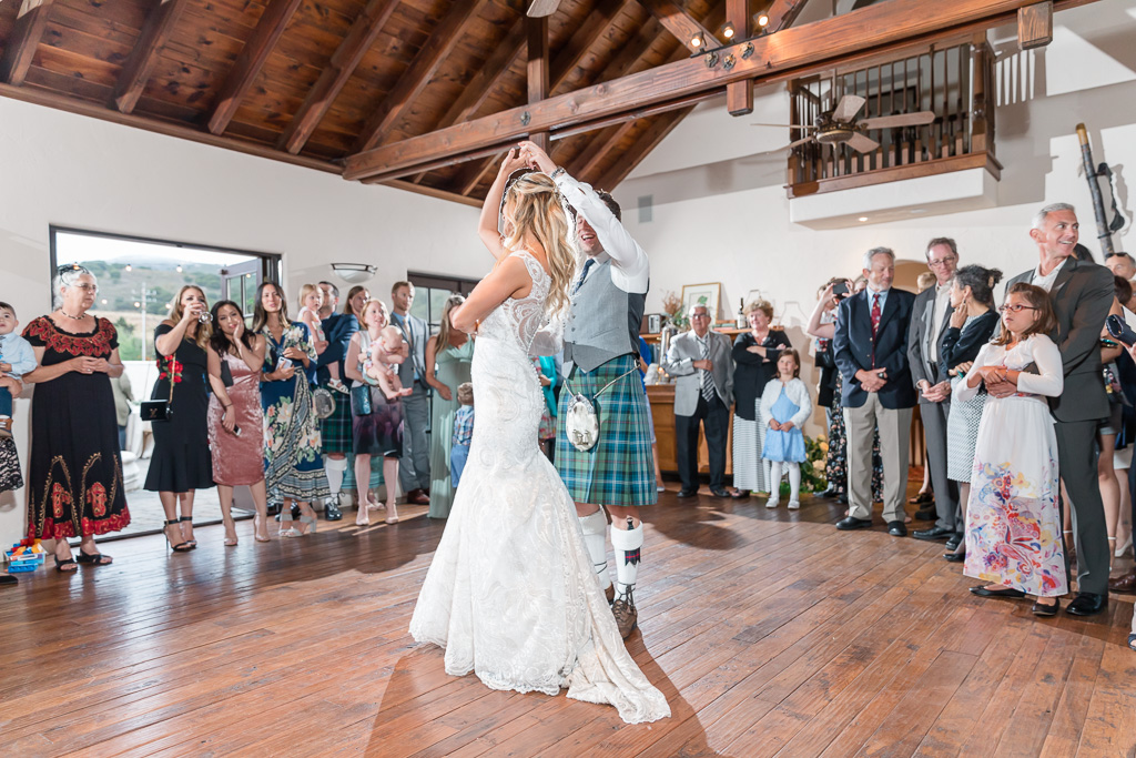 couple's first dance in the barn house