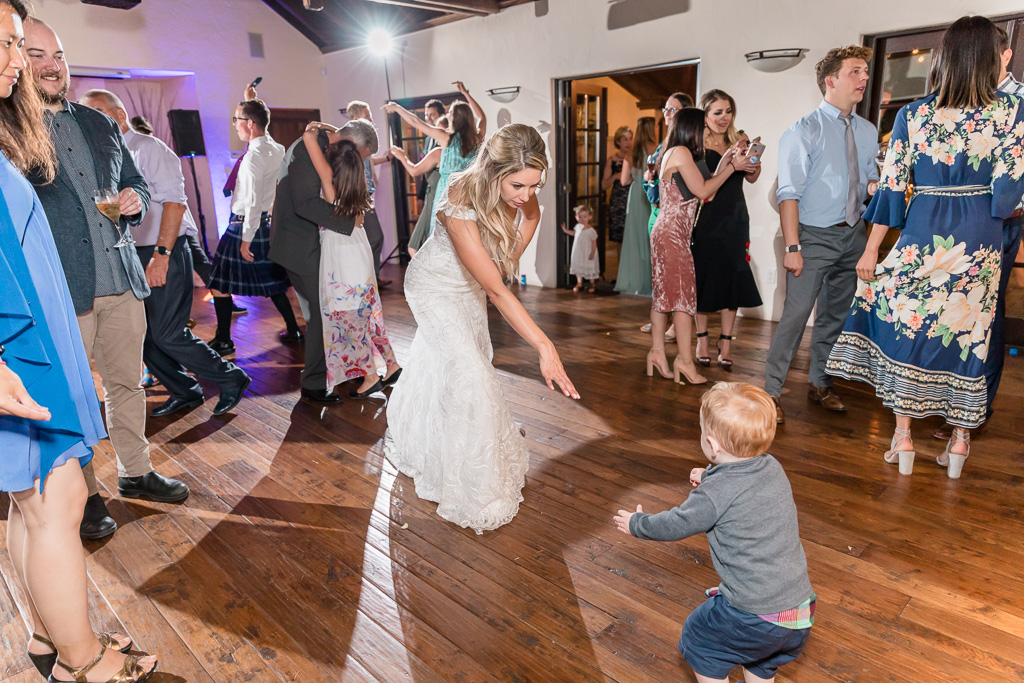 little guest dancing with the bride
