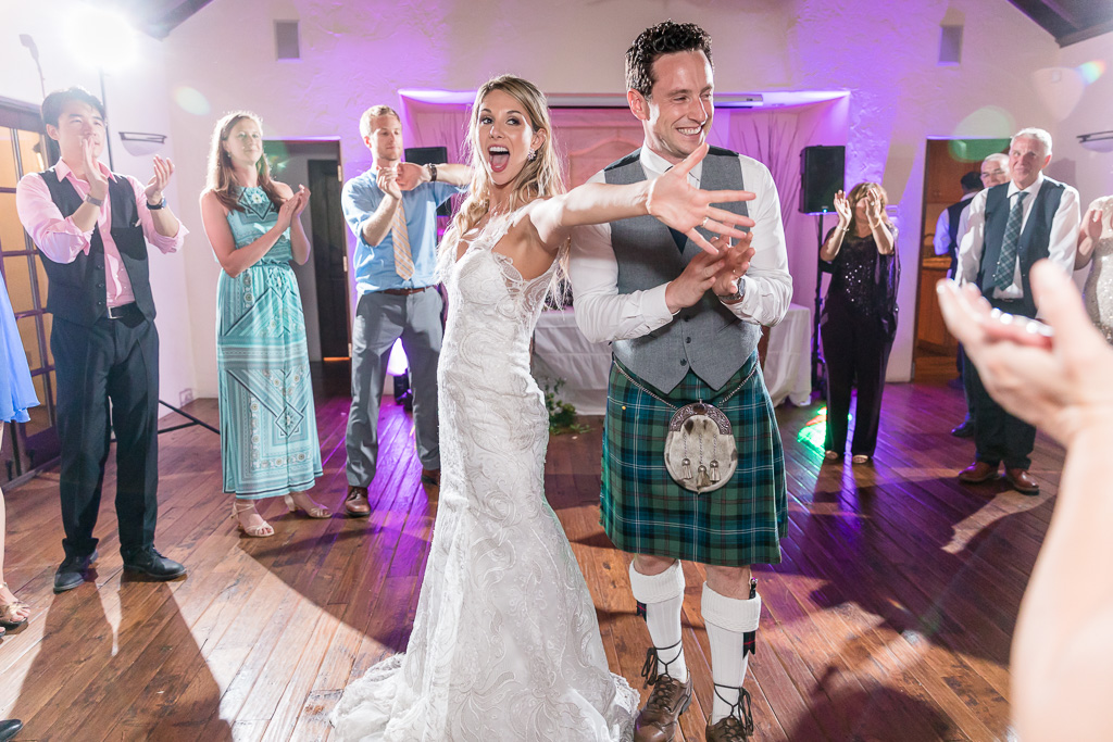 happy bride and groom on the dance floor