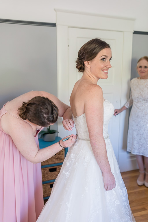 buttoning the bride up