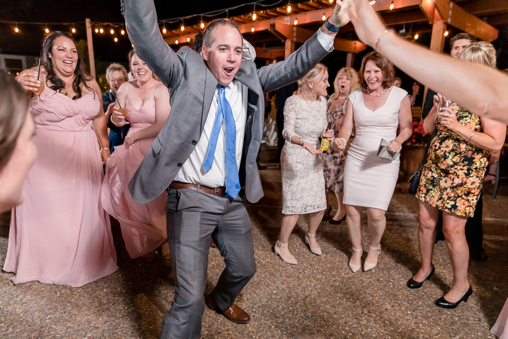 wedding guests having fun on the dance floor