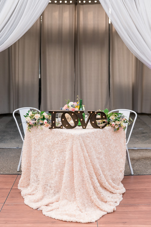 Aracely Cafe wedding soft blush sweetheart table decor