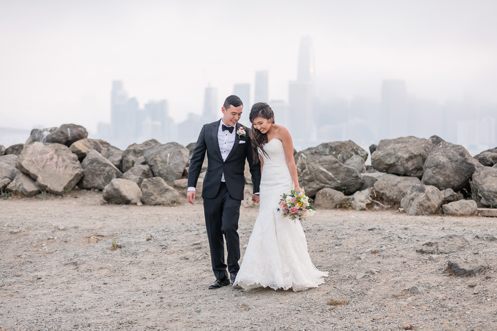San Francisco wedding sweet candid moment with the city skyline background