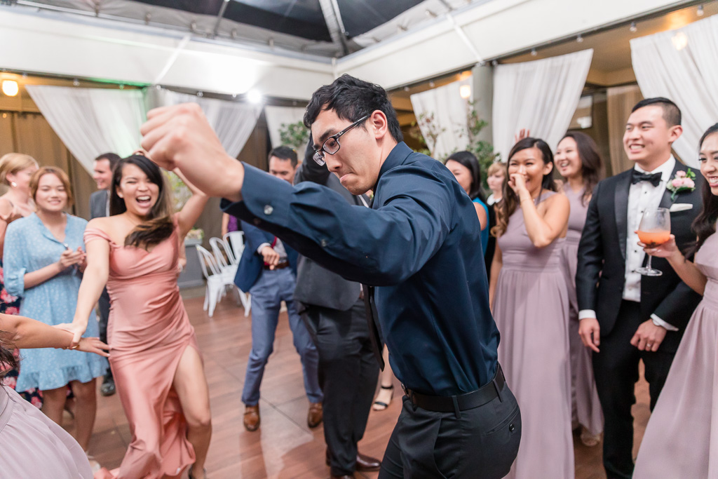 wedding guests having fun on the dance floor