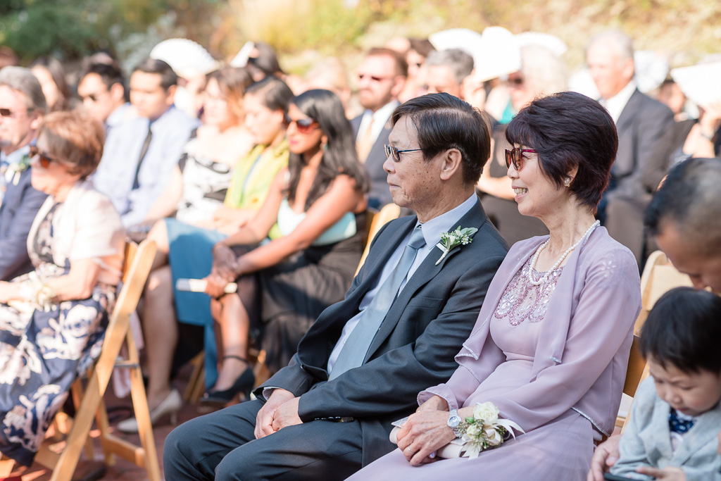 parents of the bride in the audience during ceremony