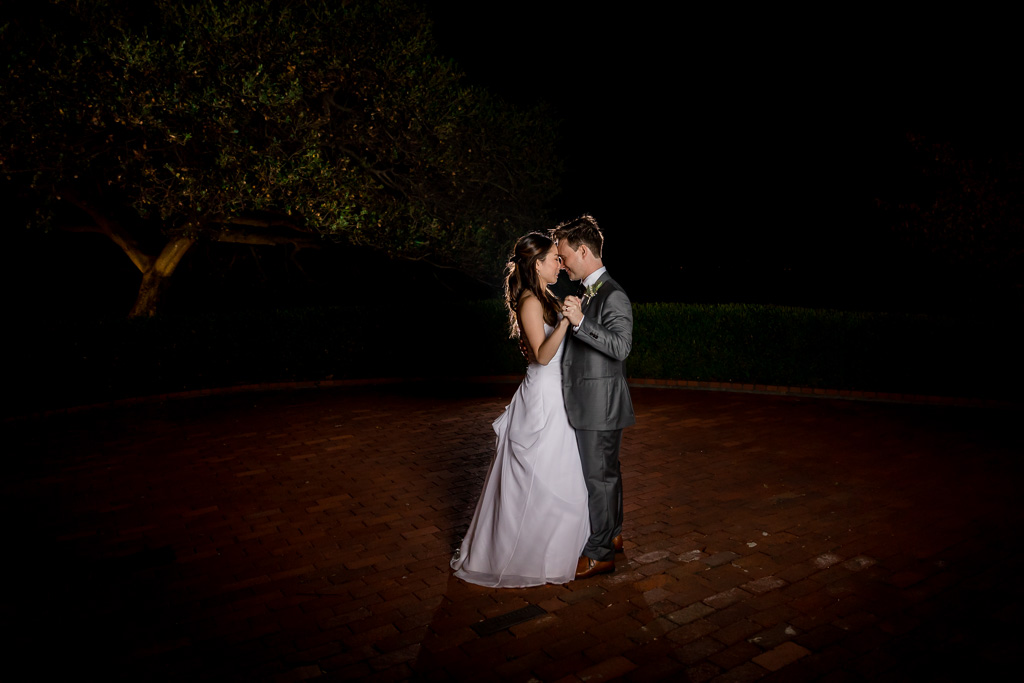 dramatic lighting for bride and groom last dance