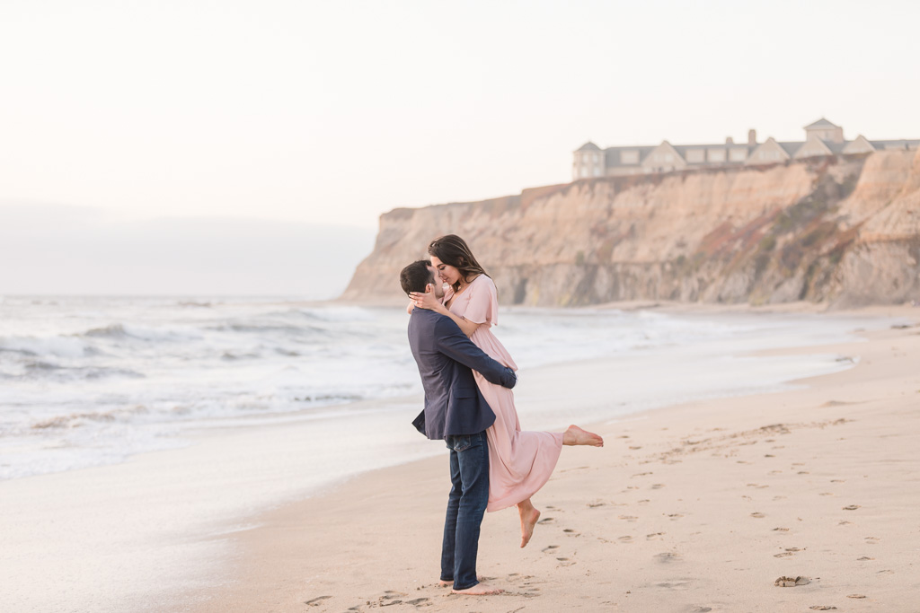 ultra romantic Half Moon Bay Ritz-Carlton engagement photo on the beach