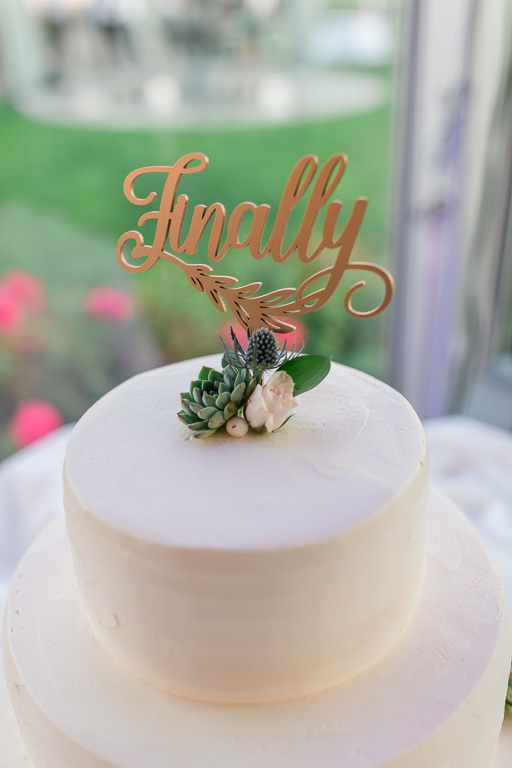 wedding cake with the word Finally