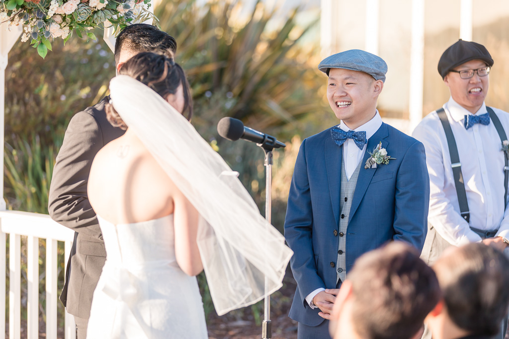 groom having a happy moment during wedding ceremony