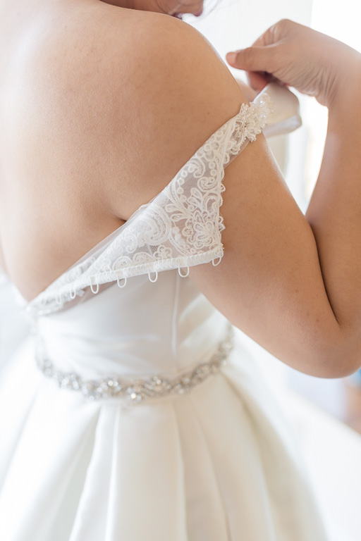 delicate details of the wedding gown