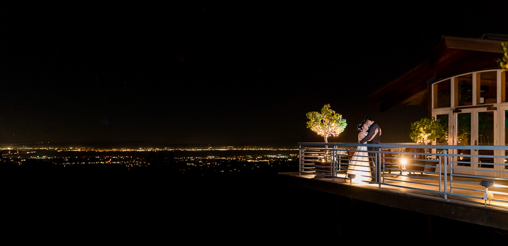night photo of bride and groom at Thomas Fogarty Winery and Vineyards