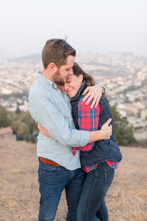 genuine emotions flowing in this photo after this San Francisco surprise proposal