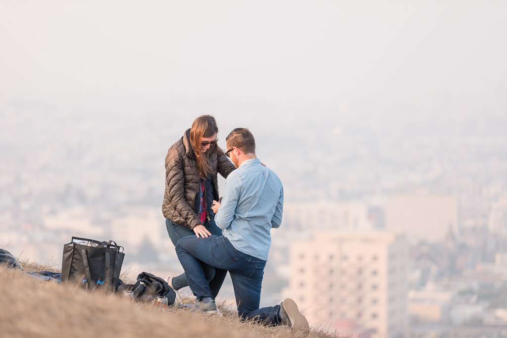 he proposed to her with a beautiful engagement diamond ring in San Francisco
