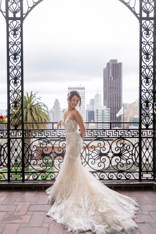 bride solo portrait on San Francisco Fairmont balcony