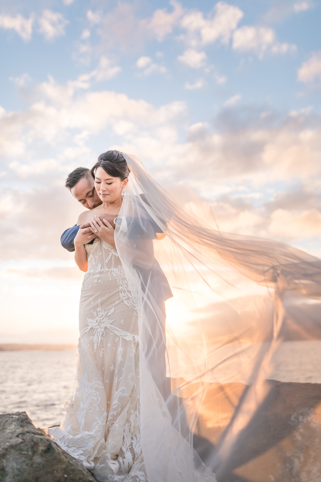 romantic San Francisco sunset coastline wedding portrait with dramatic veil
