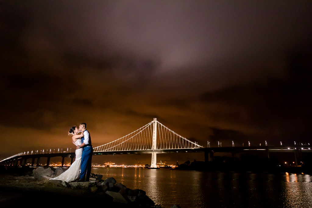best dramatic nighttime Bay Bridge wedding photo with lights